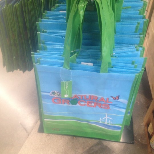 Bring your own bags or buy reusable ones at .99 cents each, or use cardboard boxes - free.