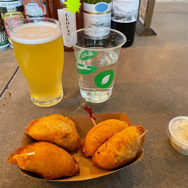City Island IPA and bite size empanadas are great!! City Island is the perfect drink for folks that like sours and gose, because there’s no hops. For the empanadas, you can choose and mix!