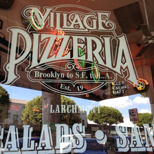 Photo taken at Village Pizzeria by Joel D. on 10/23/2012