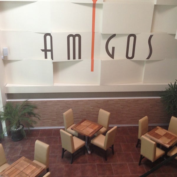 Photo taken at Amigos restaurante &amp; bar by PJ M. on 4/12/2013