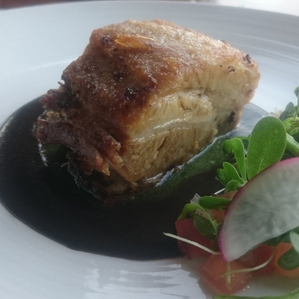 The pork belly with black bean puree & cactuse salad.