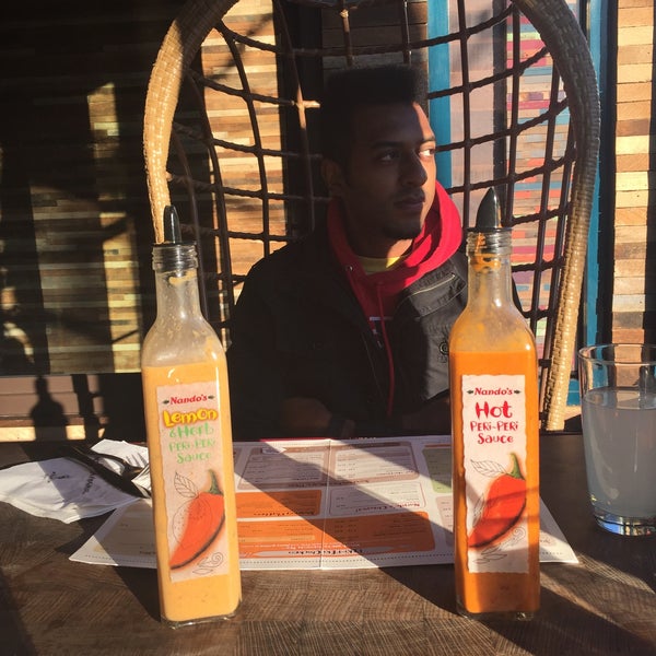 Photo taken at Nando&#39;s by Meenal P. on 11/8/2015