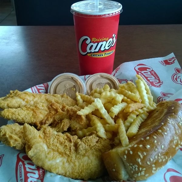 Photo taken at Raising Cane&#39;s Chicken Fingers by Aaron C. on 6/30/2014
