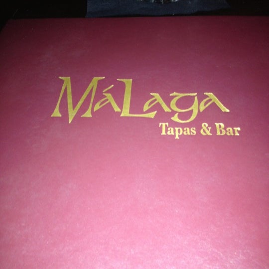 Photo taken at Malaga Tapas &amp; Bar by Ashley S. on 11/6/2012