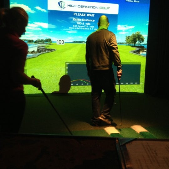 Photo taken at The Range Golf Center &amp; Sports Bar by Ashley S. on 11/30/2012