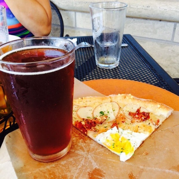 Photo taken at TRUE Crafted Pizza by Justin W. on 9/18/2015
