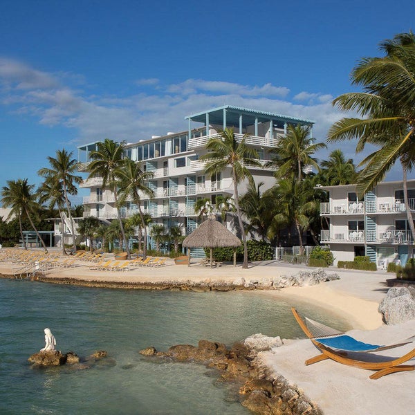Foto diambil di Postcard Inn Beach Resort &amp; Marina oleh Business o. pada 10/8/2019