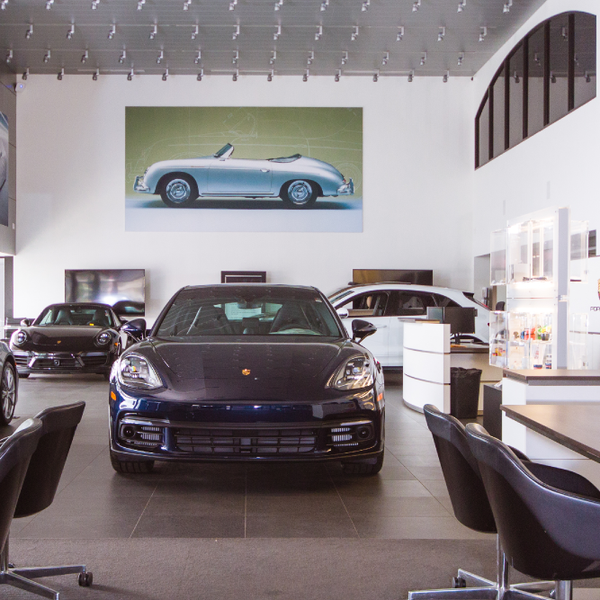 Photo taken at Tom Wood Porsche by Business o. on 3/28/2020