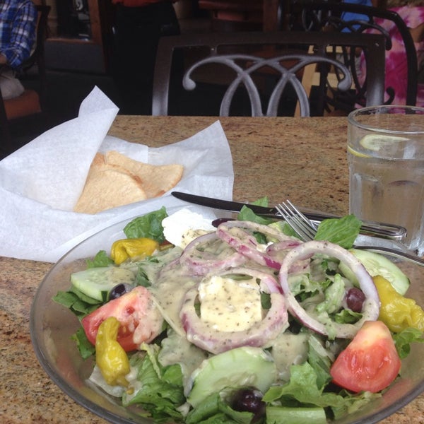 Photo taken at Apollonia Greek Bistro by Phyliss H. on 7/20/2014