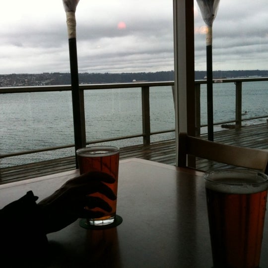 Photo taken at Katie Downs Waterfront Tavern by Aaron B. on 2/28/2011