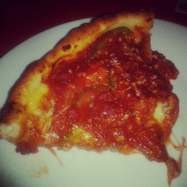 Photo taken at Stromboli Deep Dish Pizza by Stephanie N. on 8/12/2012