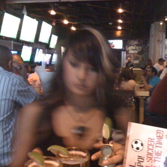 Photo taken at Ojos Locos Sports Cantina by Tom A. on 5/22/2011