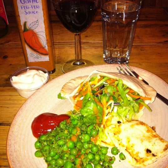 Photo taken at Nando&#39;s by Kirsty v. on 4/10/2012