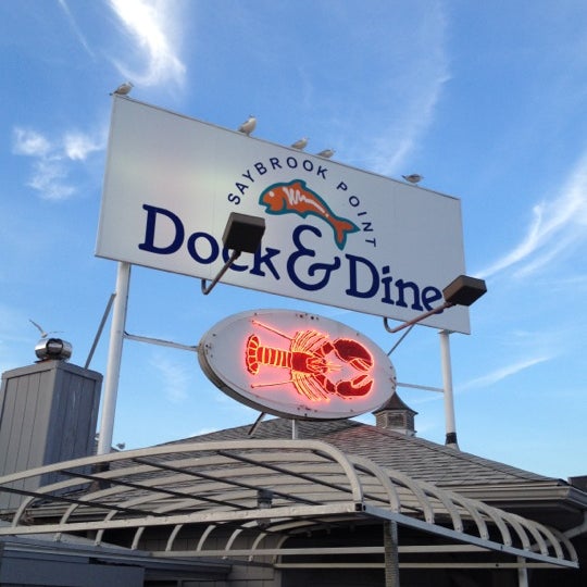 Photo taken at Dock &amp; Dine Restaurant by Dan T. on 8/25/2012