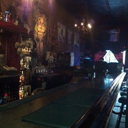 Photo taken at Surly Wench Pub by Chris B. on 12/28/2011