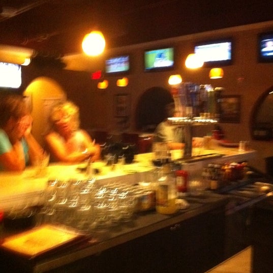 Photo taken at The Dog Bar &amp; Grille by Ddd D. on 9/1/2011
