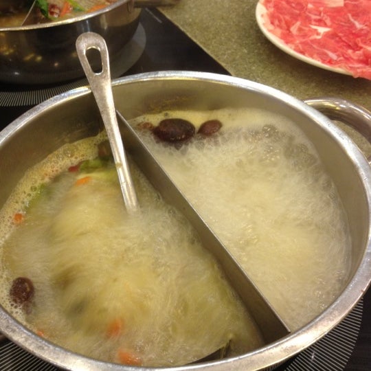 Photo taken at Happy Lamb Hot Pot by Merry on 4/19/2012