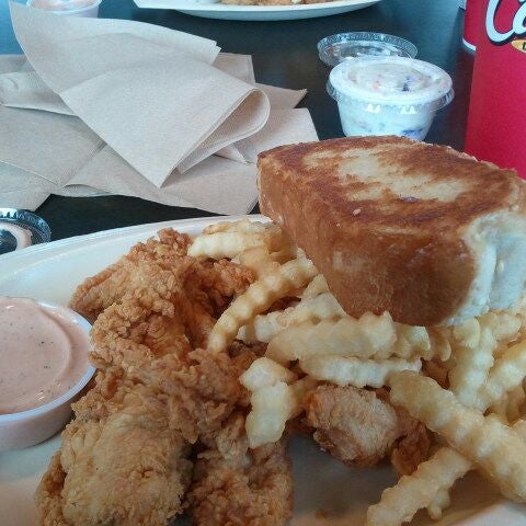 Photo taken at Raising Cane&#39;s Chicken Fingers by Joe A. on 3/17/2012