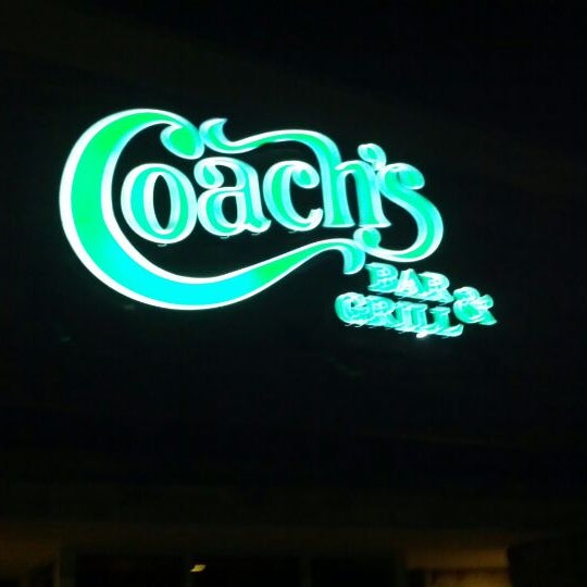 Photo taken at Coach&#39;s Bar and Grill by Andrea P. on 1/30/2012
