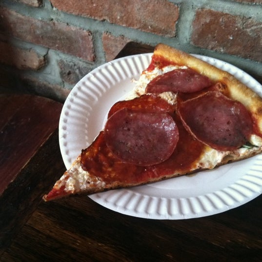 Photo taken at South Brooklyn Pizza by Alison P. on 8/3/2011