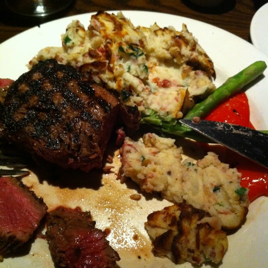 Photo taken at The Keg Steakhouse + Bar - Waterloo by Stephen W. on 1/27/2012