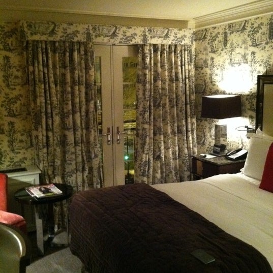 Photo taken at The Normandy Hotel by Rachel W. on 3/20/2012