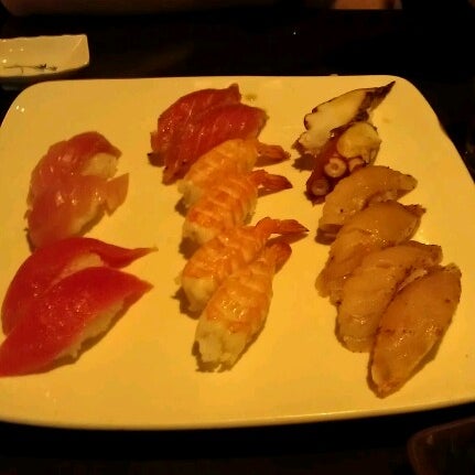 Photo taken at Sushi Delight by Christi S. on 7/28/2012