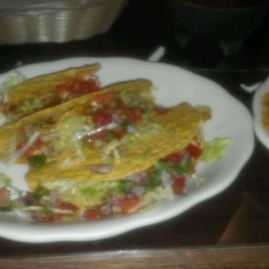 Photo taken at Tequila&#39;s Mexican Restaurant by Bianca B. on 3/18/2012