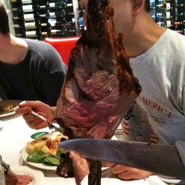 Photo taken at Pampa Brazilian Steakhouse by Stephanie C. on 8/5/2012