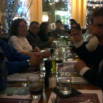 Photo taken at Dark Horse Restaurant &amp; Bar by Fiorella I. on 3/9/2012
