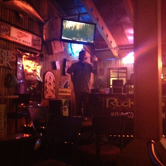 Photo taken at Rum Bullions Island Bar by Tina S. on 6/29/2012