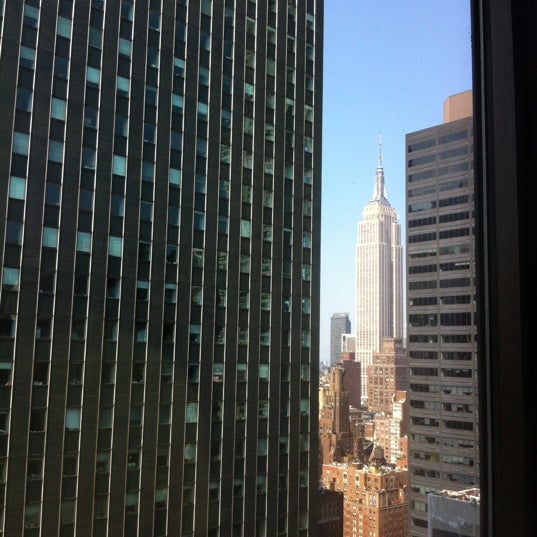 Photo taken at The New York Helmsley Hotel by Suzana U. on 7/4/2012
