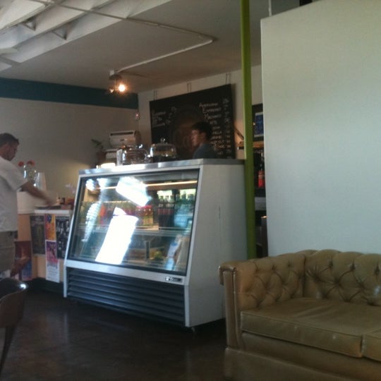 Photo taken at East Village Café by Damita M. on 8/27/2012