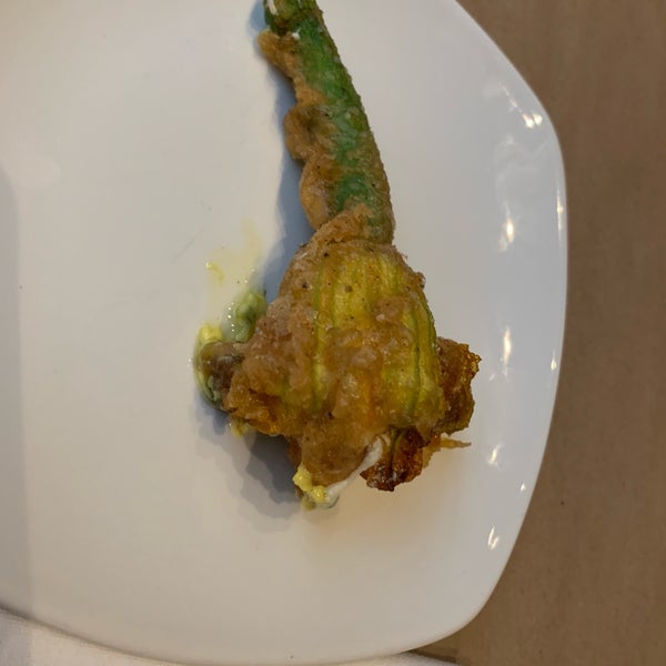 The fried squash blossoms are, yes, flowers filled w soft cheese. Like a stuffed jalapeño but not spicy; delicate and tasty!