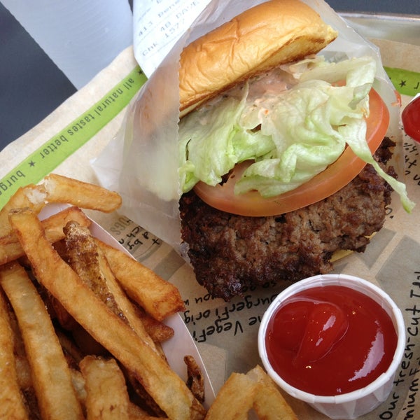 Photo taken at BurgerFi by David W. on 4/7/2013