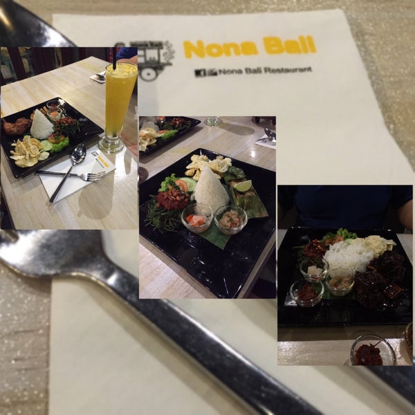 Photo taken at Nona Bali Restaurant by Atillia Z. on 5/16/2015