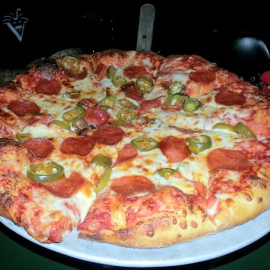 Photo taken at Pullanos Pizza &amp; Wings by Chelsea S. on 10/11/2012