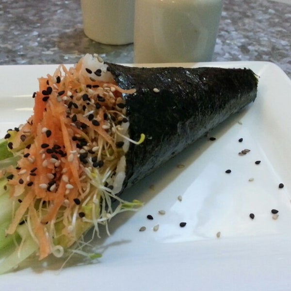 Photo taken at Tokyo Sushi Mid by Juliana C. on 6/20/2014