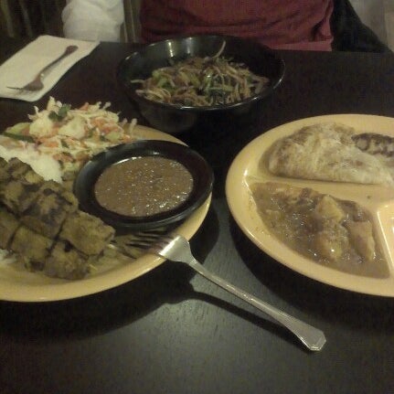 Photo taken at Satay by Denise C. on 1/3/2013