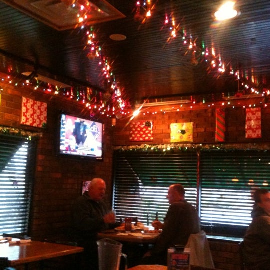 Photo taken at Village Tavern &amp; Grill by Duane Z. on 11/27/2012