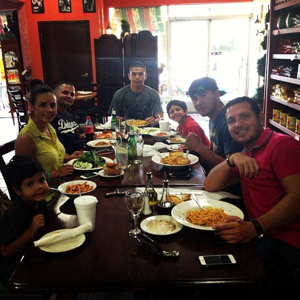 Photo taken at Roma Deli &amp; Restaurant by Bravo on 7/6/2013