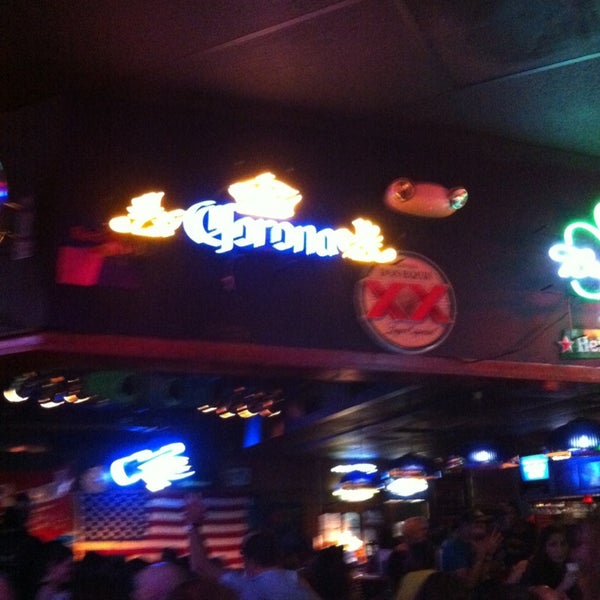 Photo taken at Little Hoolie&#39;s Sports Bar by Zahara M. on 7/25/2013