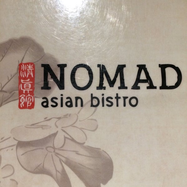 Photo taken at Nomad Asian Bistro by Jackson S. on 12/13/2014