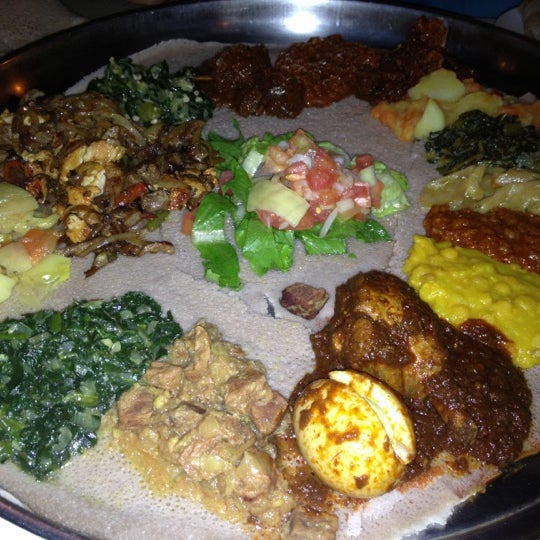 Photo taken at Ethiopian Diamond Restaurant &amp; Bar by José V. on 12/7/2012