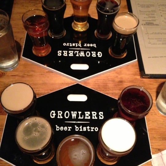 Photo taken at Growlers Beer Bistro by Jennifer D. on 12/16/2012