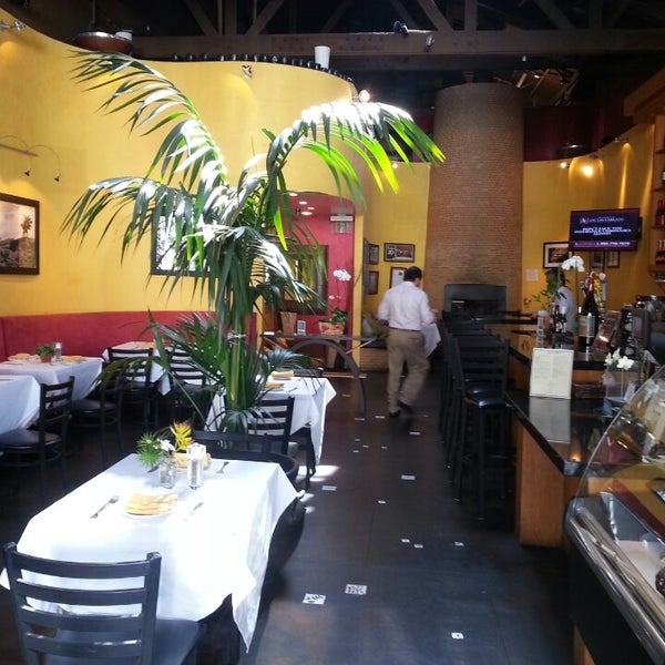 Photo taken at Coupa Café by The Joy Writer J. on 9/5/2014