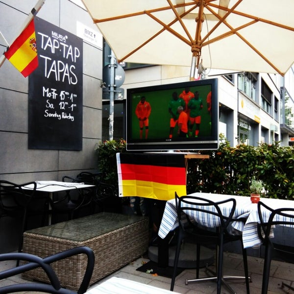 Photo taken at MIURA Tapas-Bar &amp; Restaurant by Vladimir K. on 6/19/2014