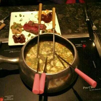 Photo taken at The Melting Pot by Jamie R. on 2/9/2013
