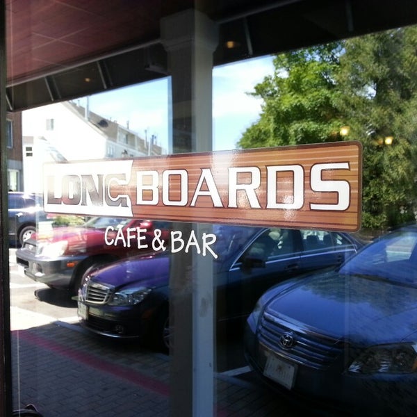 Photo taken at Longboards Restaurant &amp; Bar by Renee G. on 8/7/2013