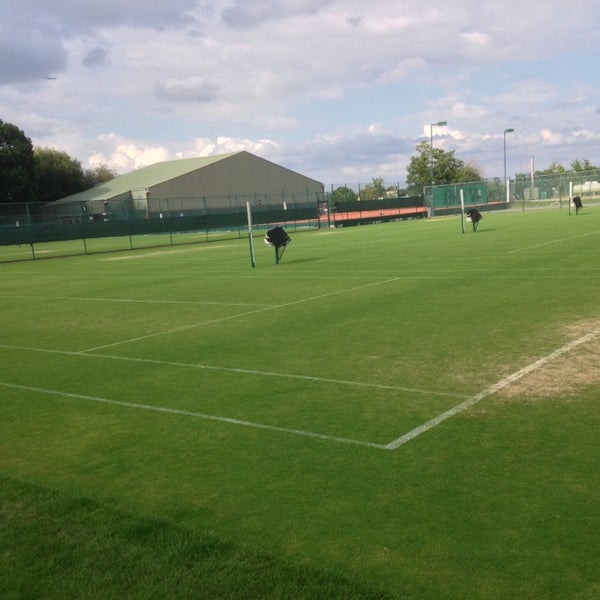 Photo taken at The Wimbledon Club by Takeshi I. on 7/13/2014